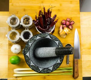 Ingredients for red Thai curry paste garlic lime black pepper lemongrass shallots cardamom cumin seeds coriander seeds
