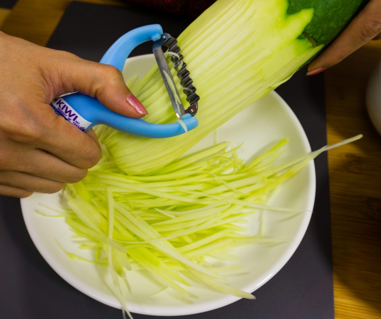 LookinsideThailand Cooking Som Tam Shredding Papaya - Look Inside Thailand