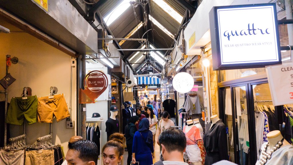 Boutique shops in the small aisles at JJ Market